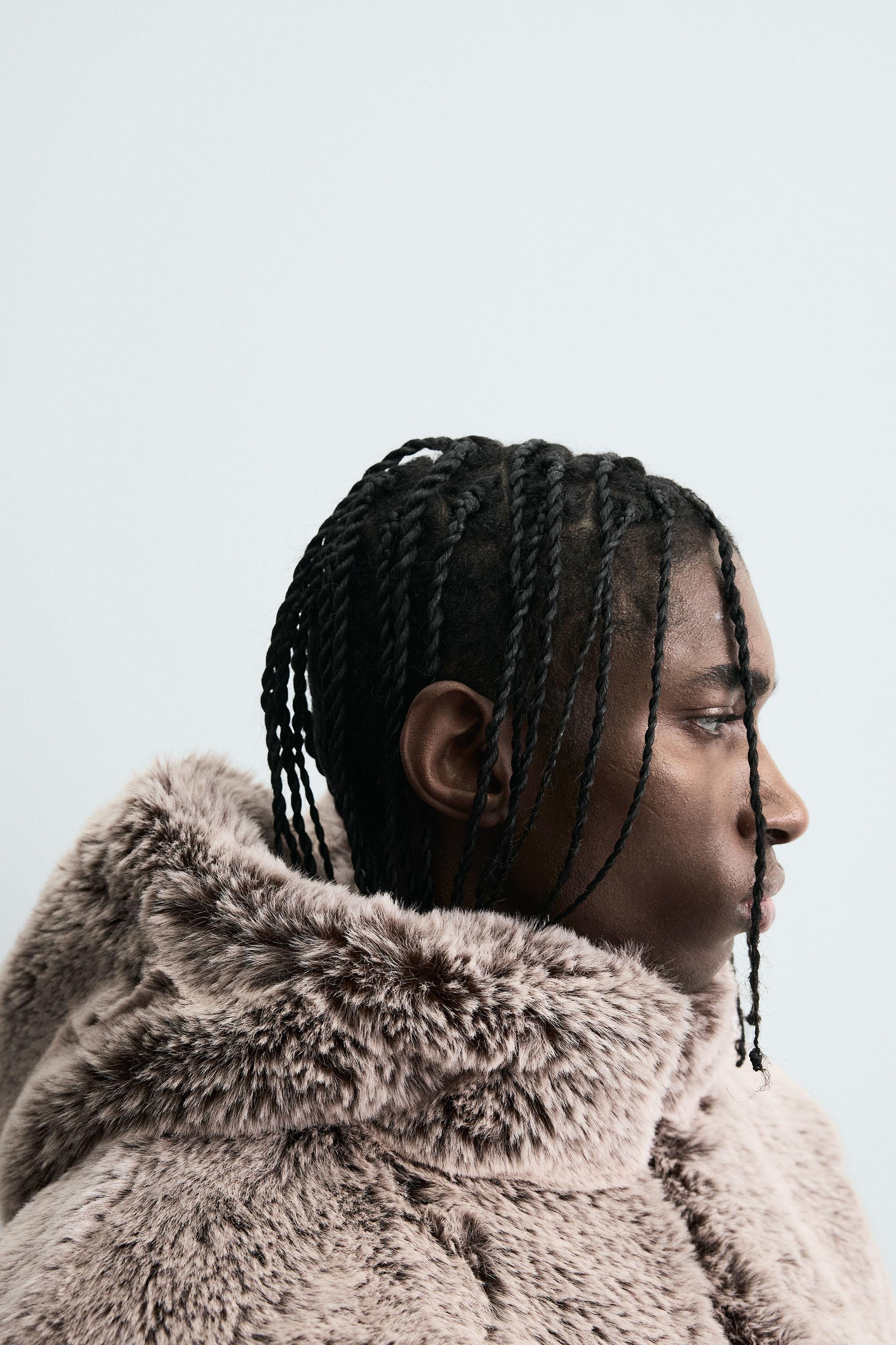 BLOUSON EFFET FOURRURE À CAPUCHE